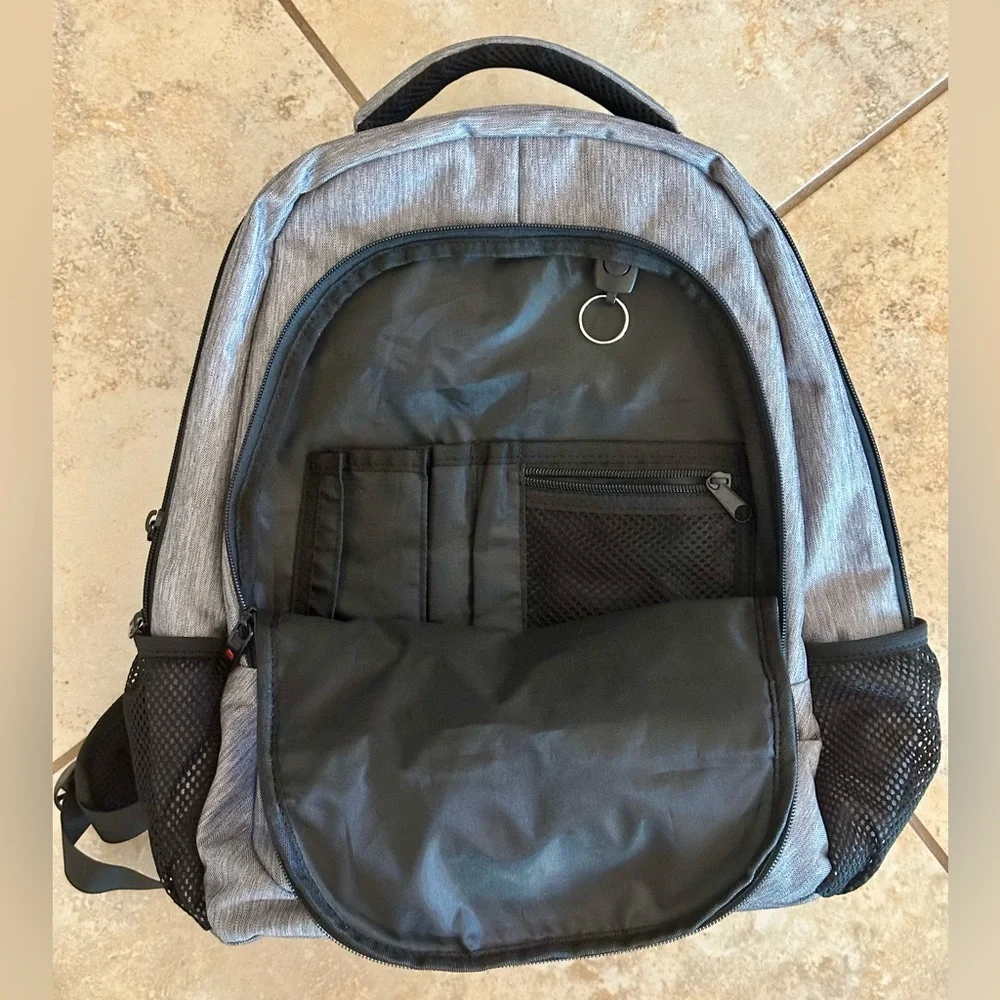 Backpack Excellent condition! Lots of zip compartments. Grey black. Clean!